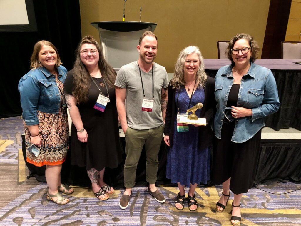 A group photo of the winners of the 2022 HippoCamp Story Slam.